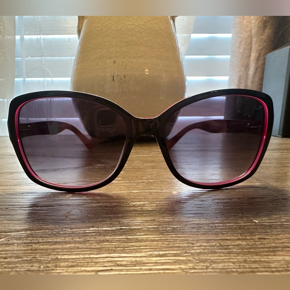 Kate spade "Ayleen " sunglasses. Black frame with pink interior.